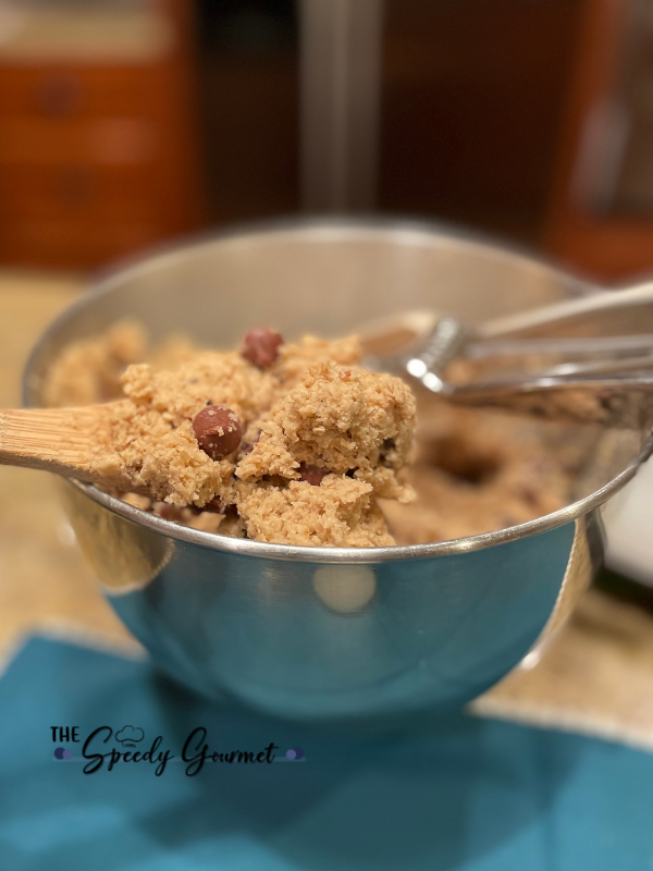 Oatmeal chocolate chip cookie dough in mixing bowl 